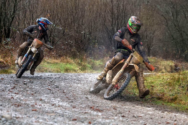 Expert rider Sion Evans from Cwmann Lampeter passes a Championship rider on the timed test on his PAR homes Fantic 250. Sion won the Expert class overall