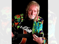 Tributes paid to famous acoustic guitarist from Pwllheli