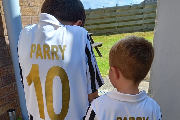 Shirts were presented to Sean's grandsons