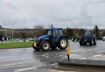 Angry farmers drive tractors to Aberystwyth to protest farming scheme