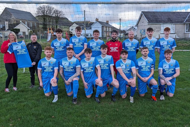 Bont have Neil and Olivia of the Red Lion Hotel for sponsoring their new away kit