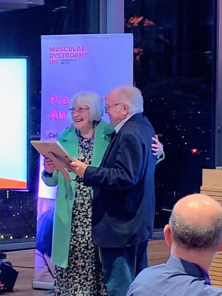Ann Hughes received her award from Richard Attenborough’s son, Michael