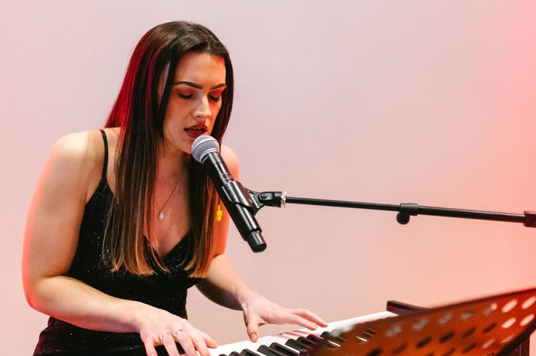 Sara Davies performs at the BAFTA Cymru: An Audience with Lindy Hemming, photographed by Feruza Afewerki on Monday 3 March 2024 at BAFTA, 195 Piccadilly, London, U.K. (Image Â©BAFTA/Feruza Afewerki, 2024).
