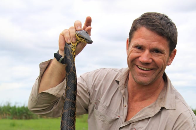 Steve Backshall, pictured here holding a snake, will give a on venom