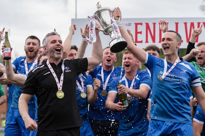 NEWTOWN, WALES - 29 APRIL 2023: Trethomas win the game 2-1 and celebrating winning the 2022/23 FAW Amateur Trophy Final fixture between Denbigh Town FC & Trethomas Bluebirds AFC at Latham Park, Newtown, Wales, 29 April 2023. (Pic by John Smith/FAW)