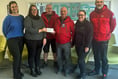Business gives £1,000 to Gwynedd search and rescue team