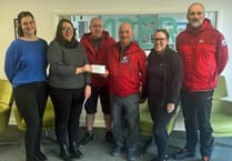 Aberystwyth business donate funds to Gwynedd search and rescue team