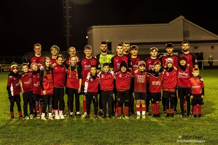 Penrhyncoch with their mascots at the derby against Bow Street
