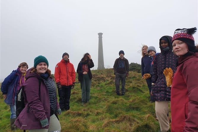 The ACV student volunteer group with Beca Davies (front left) near the Wellington Monument on a damp Sunday last month