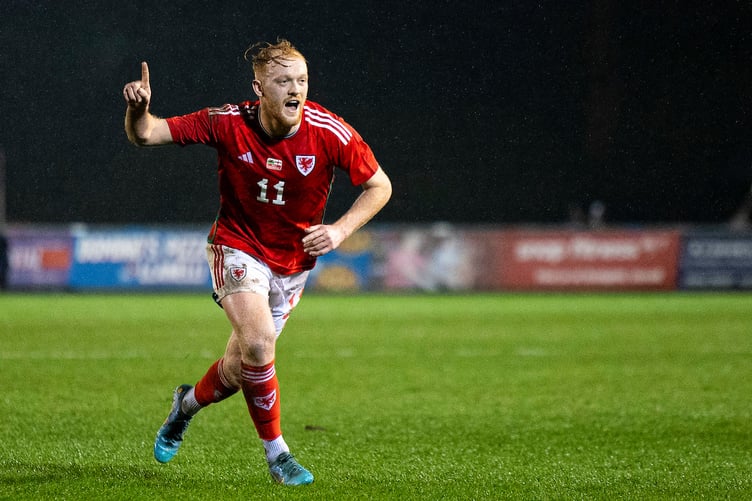 Llanelli, Wales - 19th March 2024:
Sion Bradley of Cymru celebrates scoring his sides first goal from a free kick.
Cymru v England C in an International Friendly at Stebonheath Park on the 19th March 2024. (Pic by Lewis Mitchell/FAW)