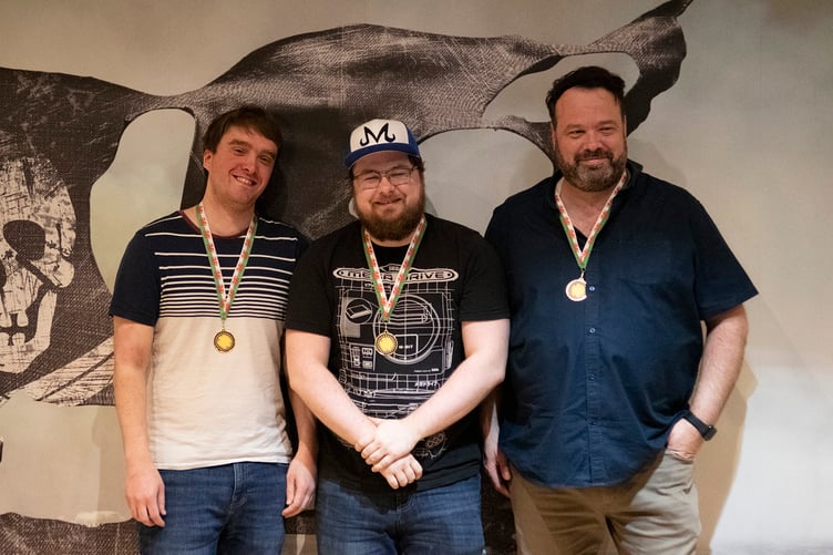 Division Three three-a-side winners Chris, Eddy and Luke of Cambrian