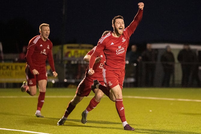 LLANDUDNO, WALES - 23RD MARCH 2024:  Connah's Quay Nomads' Aron Williams puts The Nomads 1-0 up in the 89th minute during the JD Welsh Cup Semi Final fixture between Connah's Quay Nomads and Bala Town at the OPS Wind Arena, Llandudno. 23rd of March, Llandudno, Wales (Pic by Nik Mesney/FAW)
