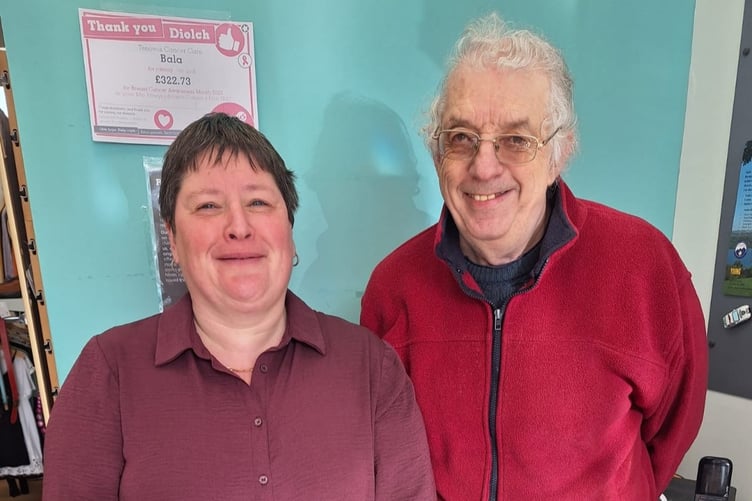 Volunteer Anthony (right) works at the Bala Tenovus Cancer Care Charity Shop six days a week with Assistant Shop Manager Nia Hughes (left)