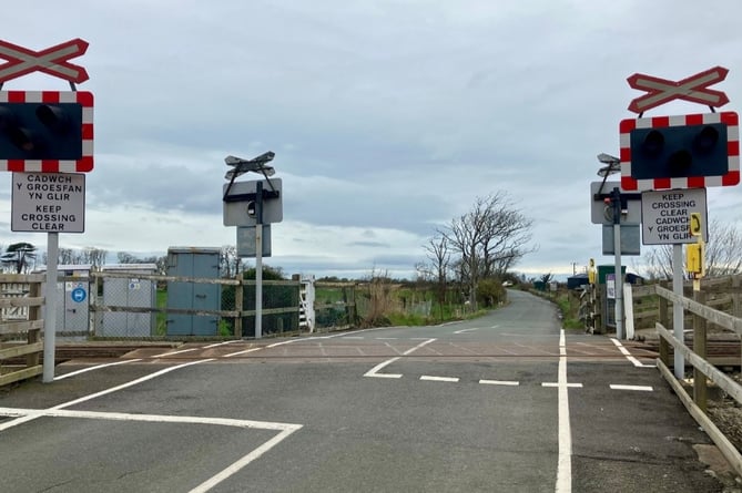 Network Rail is urging level crossing users at Llanbedr's Talwrn Bach to remain vigilant