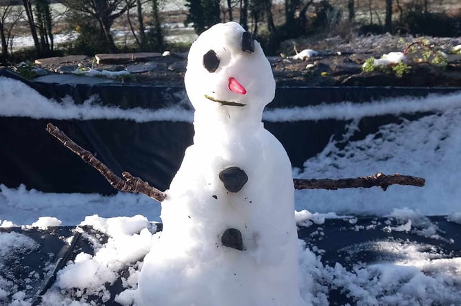 Possibly the worst snowman in the world but we love him anyway
