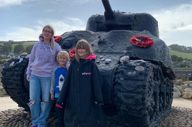 Polly, Remy and Lyra Morgan (L-R) visiting Slapton Sands 'Exercise Tiger' WWII memorial site in 2022