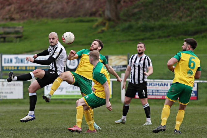 LLANIDLOES, POWYS, WALES - 13th APRIL 2024 - Flint's Lewis Sirrell shoots during Llanidloes Town vs Flint Town United in round 15 of the JD Cymru North at Victoria Park, Llanidloes (Pic by Sam Eaden/FAW)