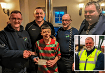 Motorbike club give cheque to rugby club juniors in memory of friend
