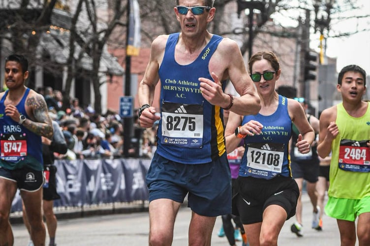 Paul and Tracey out on the course in Boston