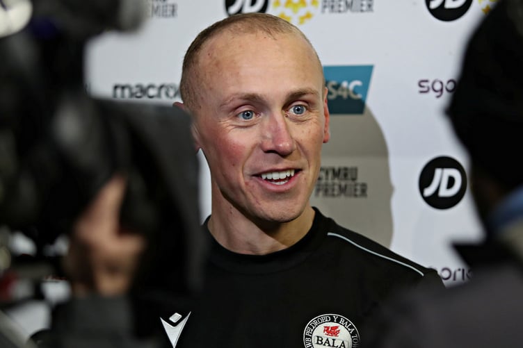 BALA, GWYNEDD, WALES - 5th APRIL 2024 - Bala's Kieran Smith is interviewed by Sgorio after Bala Town vs Newtown AFC in round 30 of the JD Cymru Premier at Maes Tegid, Bala (Pic by Sam Eaden/FAW)
