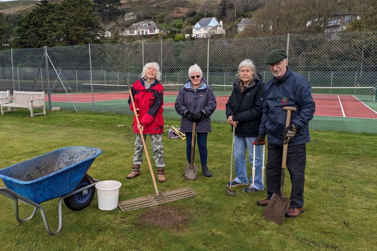 The players prepared the lawn last month for the start of the new season