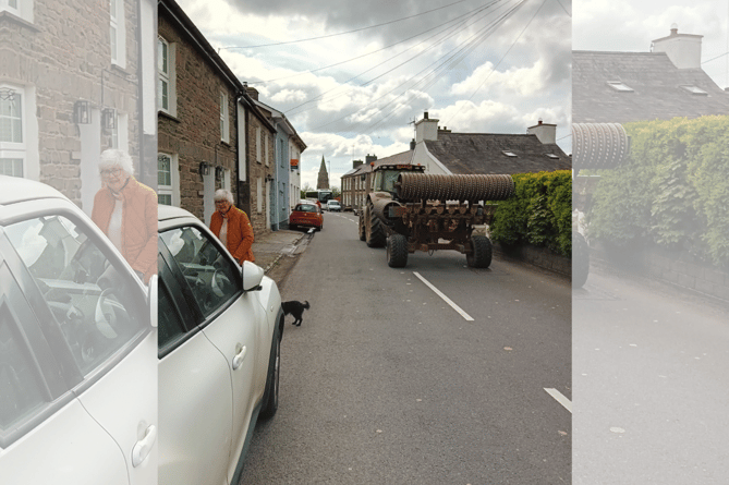 A resident attempting to walk on the small stretch of pavement against an oncoming tractor