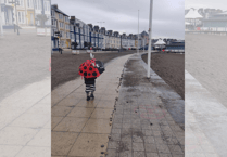 Cleaners sweep away peace pebbles on Aber prom