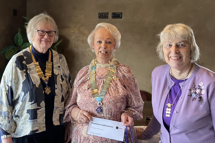Club President Christine Sutherns, District Chair Brenda Scourfield and Club member Pat Sani