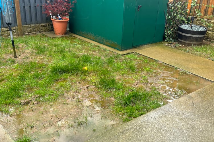 Anne Cook is angry about the state of her flooded garden