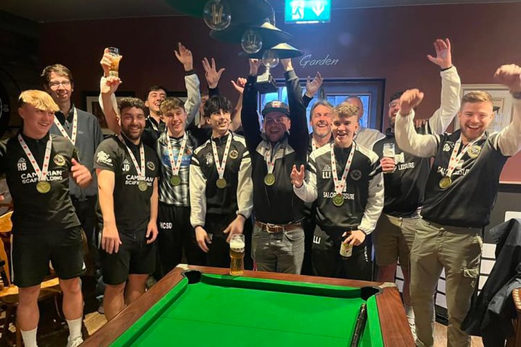 Bow Steet received the trophy and their medals after the match at Hay St Marys