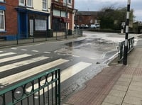 Water company comes under fire as high street leak continues