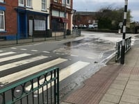 Water company comes under fire as high street leak continues