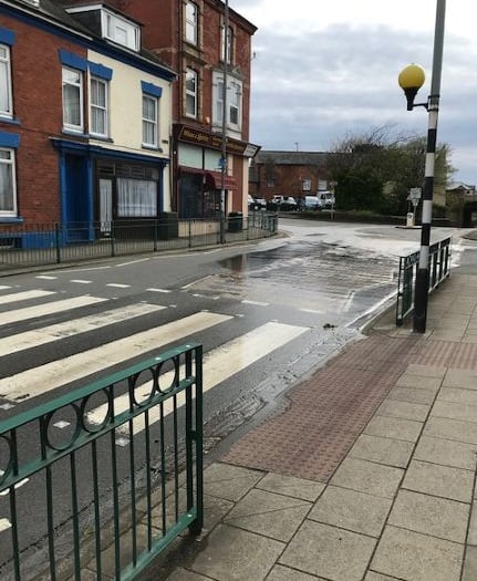 Water company comes under fire as high street leak continues