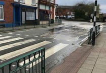 Water company comes under fire as high street leak continues