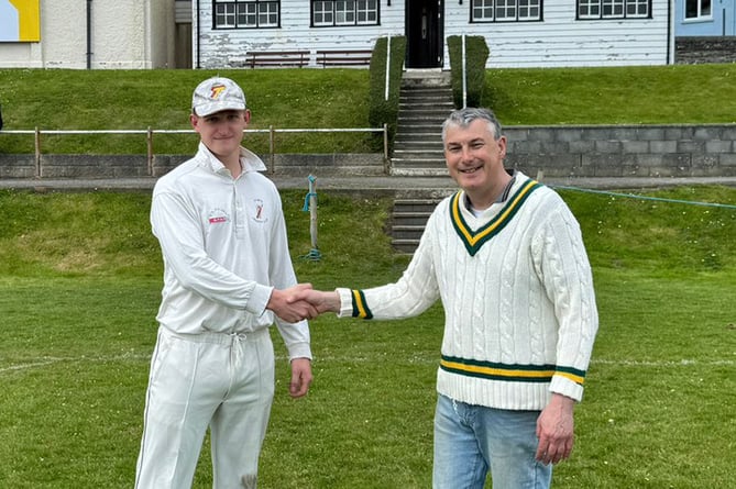 WWCCC chairman Huw Chambers congratulates Jack Williamson of Tywyn on being the leading batsman in the 2023 competition