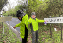 Father and son clean Ceredigion village signs