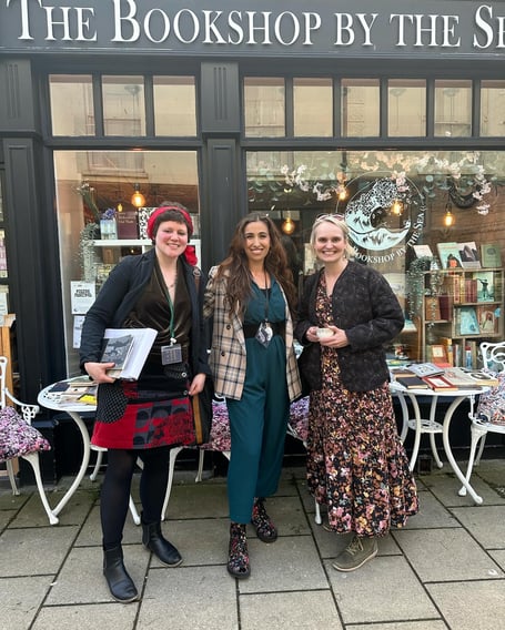 Festival director Freya Blyth with poet and campaigner Rae Howells and festival host and editor Emily Trahair