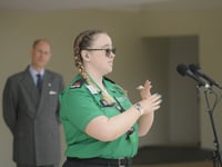 Hafwen gives speech in sign language at Buckingham Palace