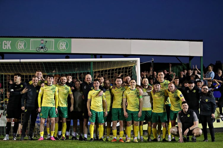 CAERNARFON, GWYNEDD, WALES - 10th MAY 2024 - The Caernarfon squad and fans after Caernarfon Town FC vs Cardiff Metropolitan University FC in the JD Cymru Premier playoff semi-final at The Oval, Caernarfon (Pic by Sam Eaden/FAW)