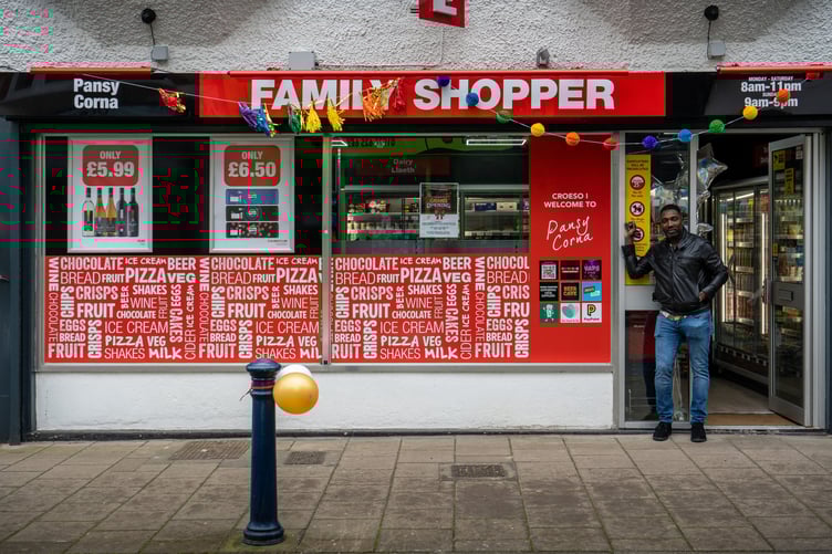Phillip Powell outside Pansy Corna - the convenience store which brought plantain to Aberystwyth