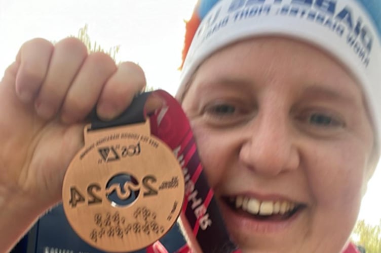Laura with her London Marathon medal