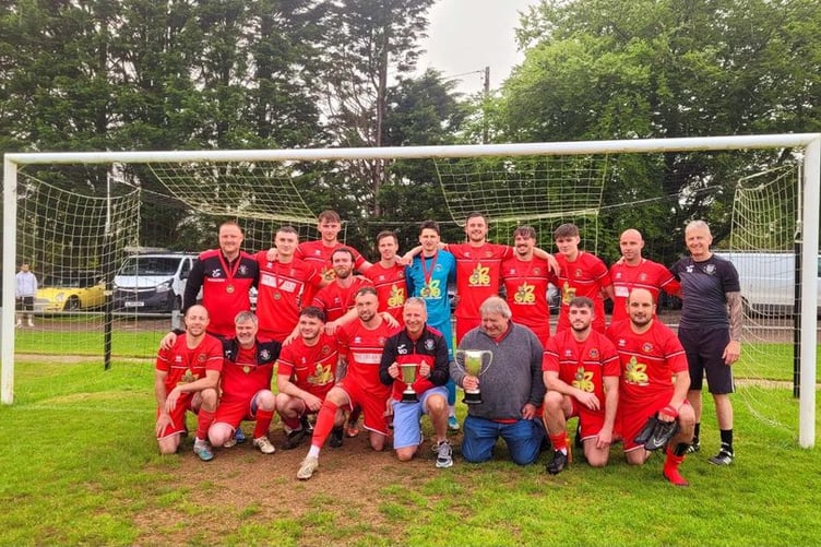 Newcastle Emlyn with the Division Two and South Cards Cup trophies