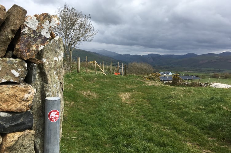 A Llwybr Cadfan way mark on Beacon Hill near Tywyn