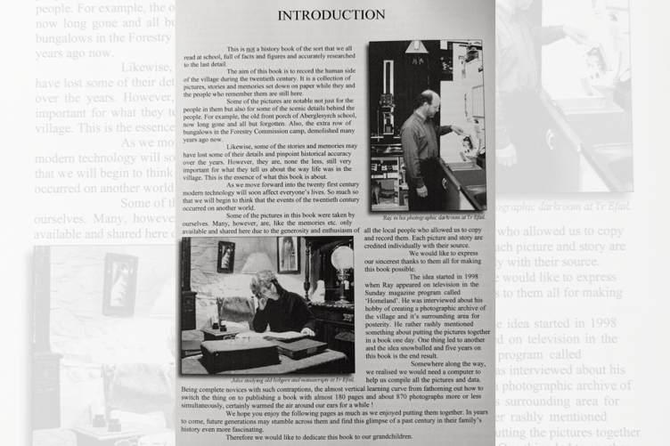 Julia and Ray at work, captured in the front of their book