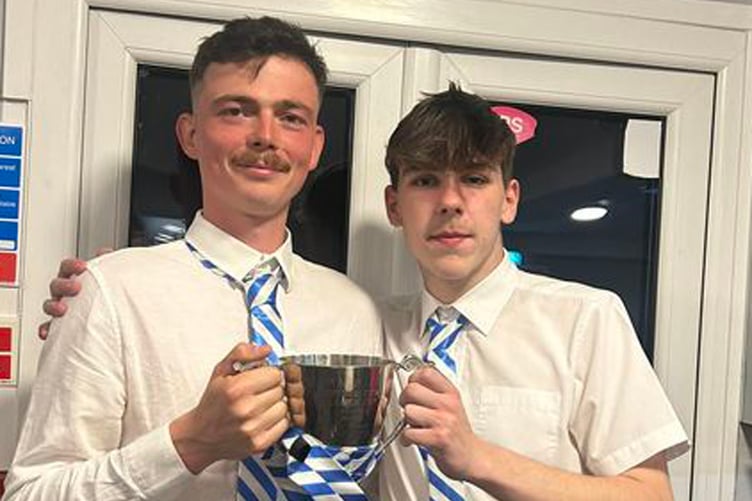 Machynlleth player manager Callum Page and captain Alfie Westwood with the cup