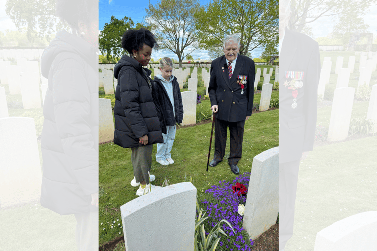 Lyra with presenter Emma-Louise Amanshia and Arthur Oborne at his friends grave in Normandy