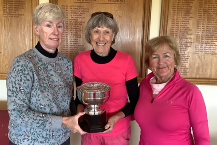 Captain Catrin Pugh Jones presenting Karen Evans with the Edith Beddard trophy. Catrin finished second with Breda Roberts third