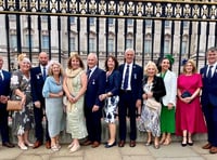 RNLI volunteers celebrate long service at Royal palace garden party