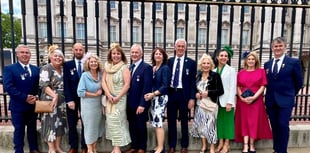 RNLI volunteers celebrate long service at Royal palace garden party