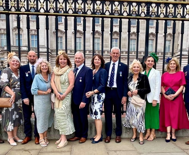RNLI volunteers celebrate long service at Royal palace garden party